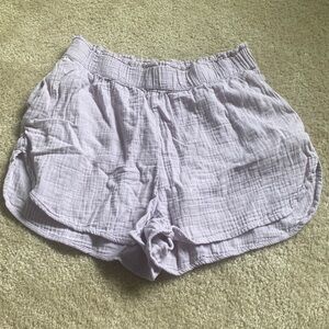 Light purple shorts. Super lightweight but not see through. With pockets!